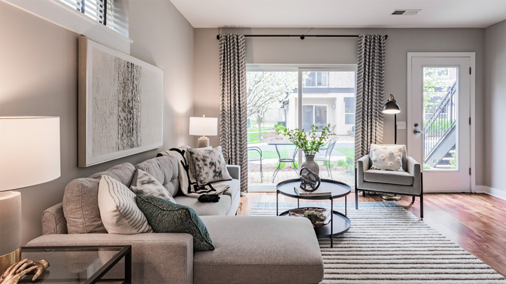 a living room with a couch and a table