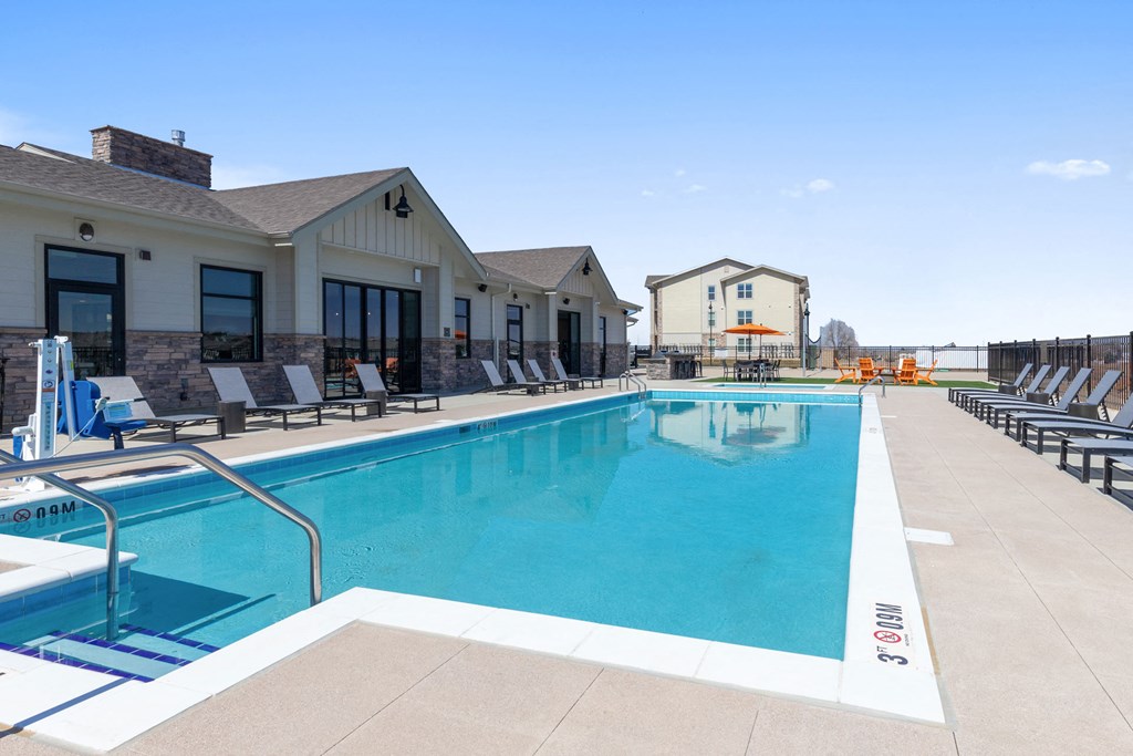 our apartments have a large swimming pool with lounge chairs