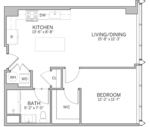 A floor plan of a home with a kitchen, living/dining area, bedroom, bathroom, and a workspace.