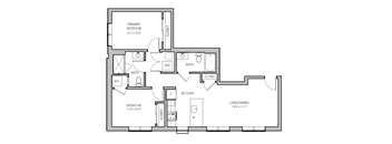 A floor plan of a house with a primary bedroom, a living/dining area, a kitchen, a bath, and a laundry room.