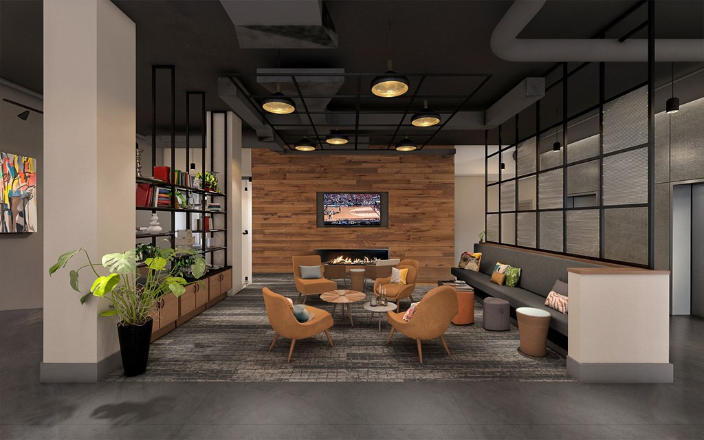 A modern living room with a wooden wall and a large screen on the wall.