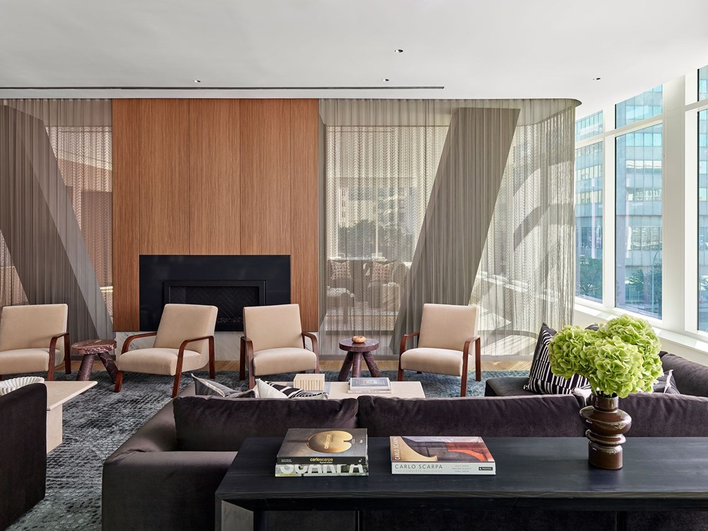 A living room with a fireplace and a couch.
