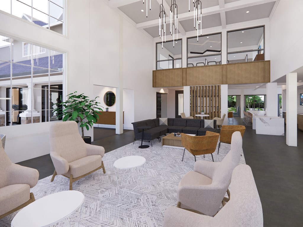 a living room with couches chairs and tables and a staircase