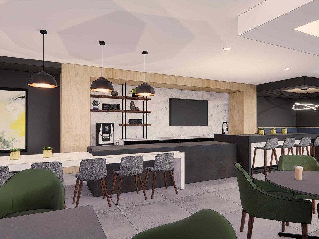 A modern dining area with a bar and chairs.