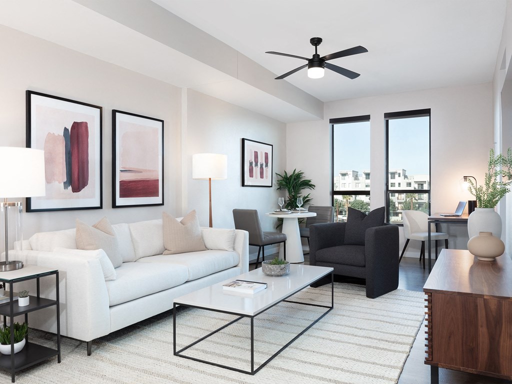 a living room with a white couch and a coffee table at AVE Phoenix Terra, Phoenix
