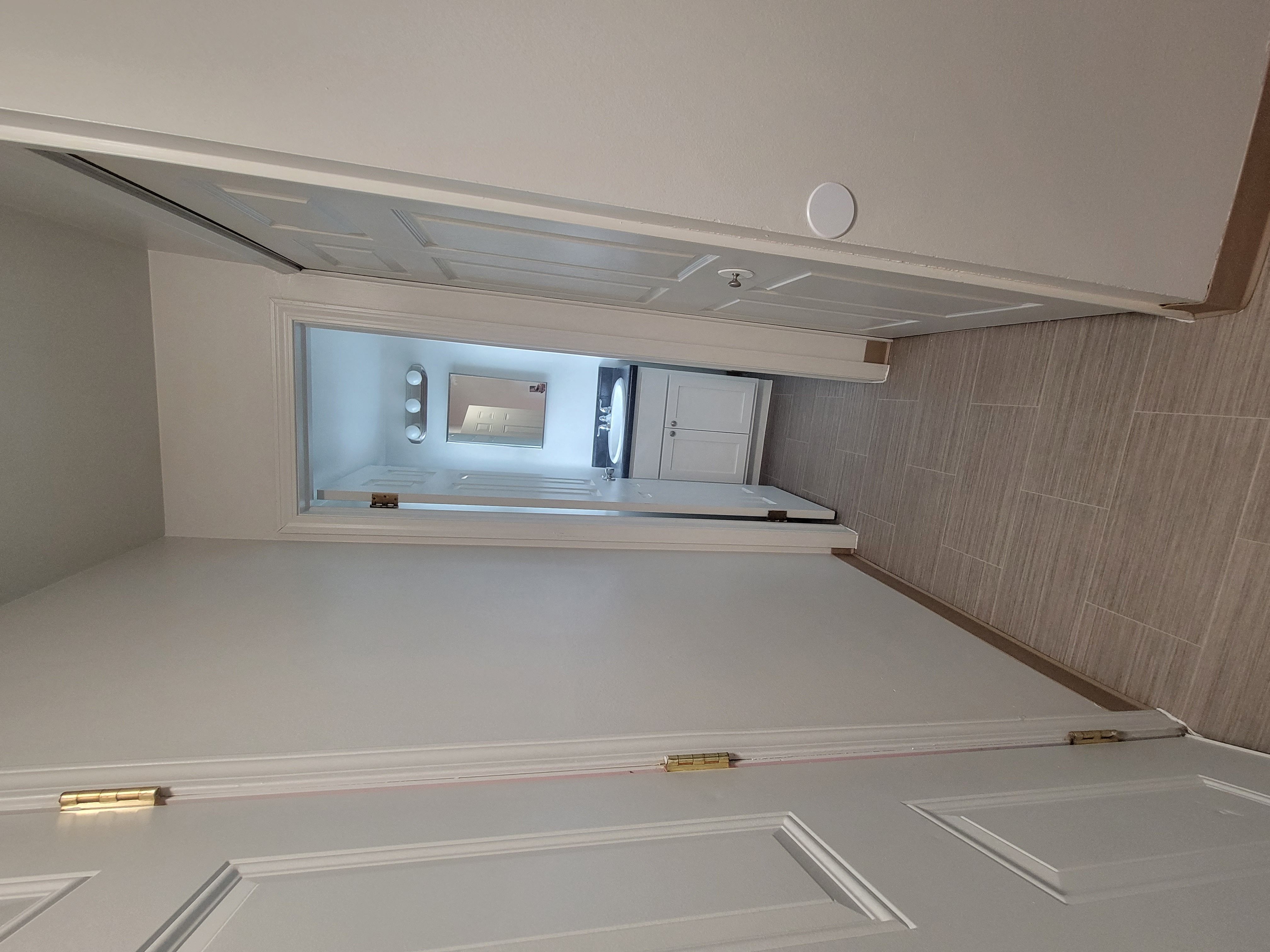 2 Bed- 1st Floor Hall Closet and Half Bathroom