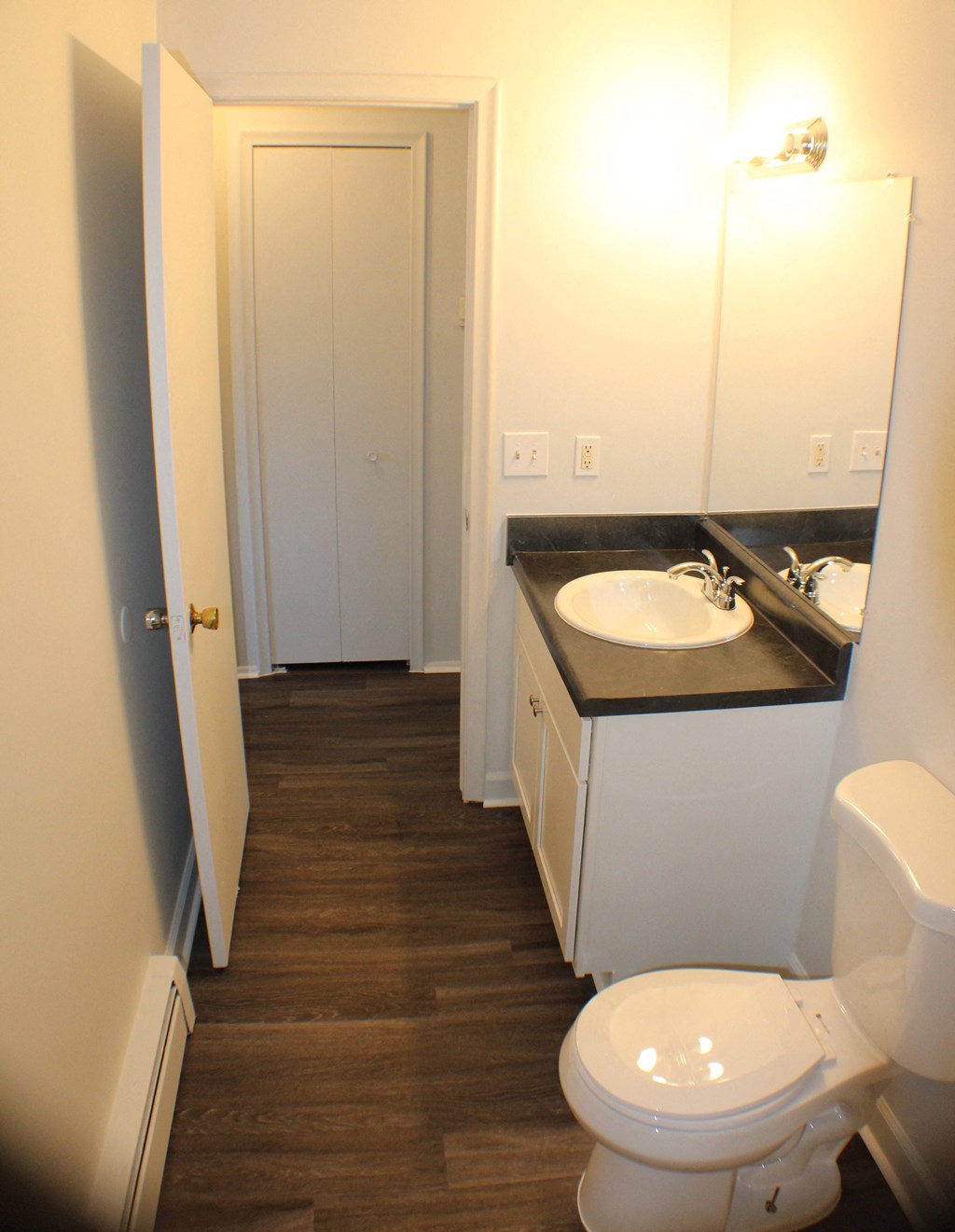 a small bathroom with a toilet and a sink