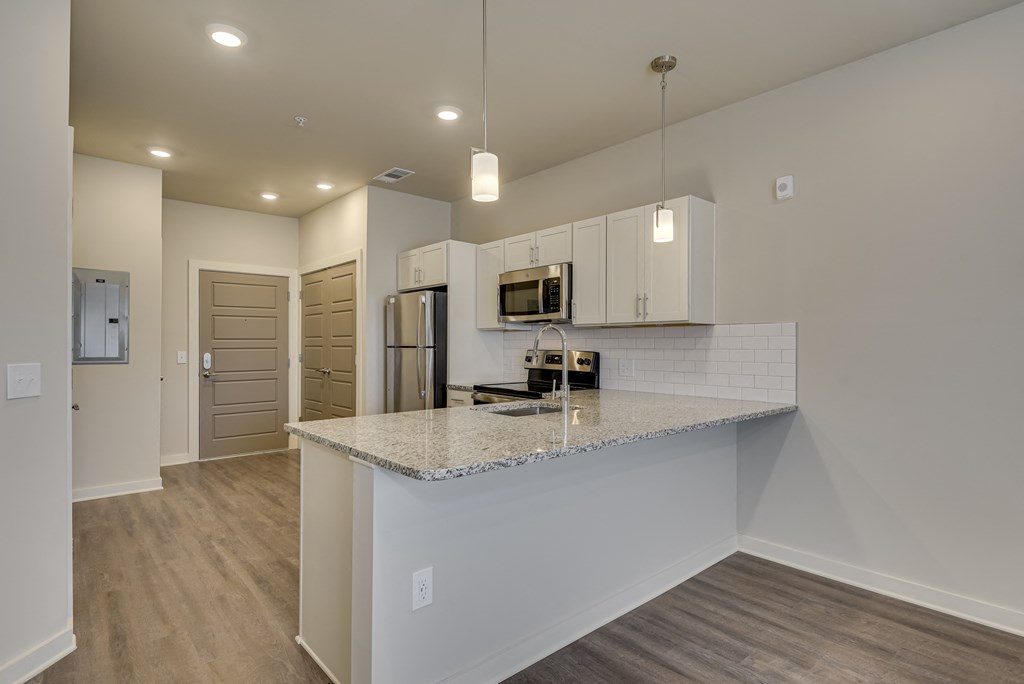 Kitchen peninsula with area for seating