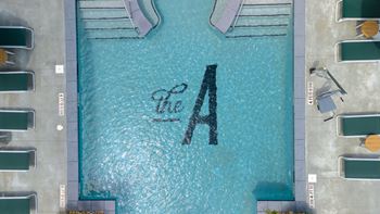 a swimming pool with the letter a in the water at The Augustan, Augusta