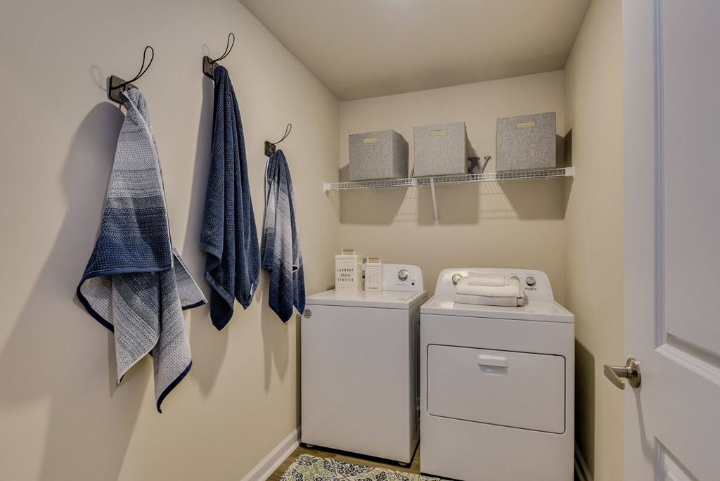 private laundry room with washer and dryer at the preserve at great neck apartments