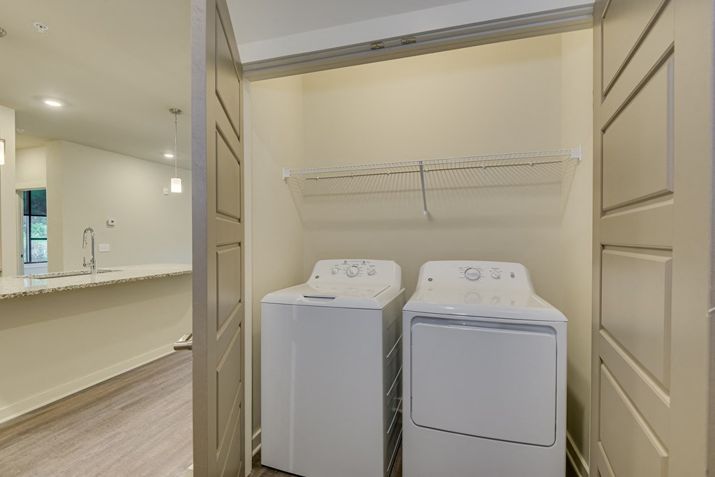 a washer and dryer in the laundry room of a house