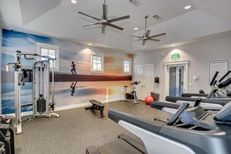 Fitness center with weights and treadmill