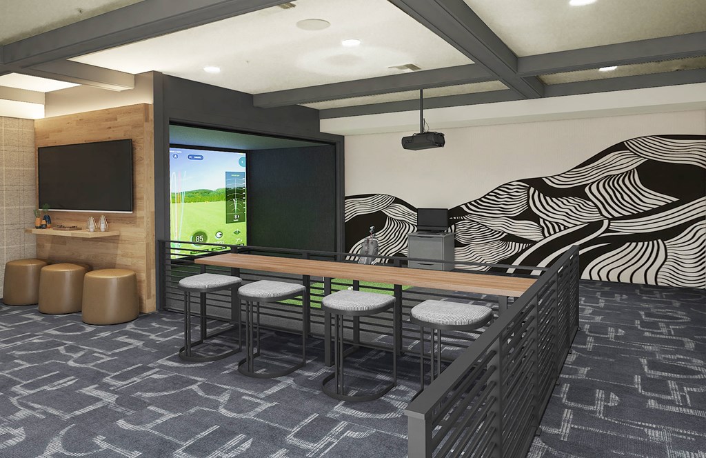 a dining area with a table and chairs and a television