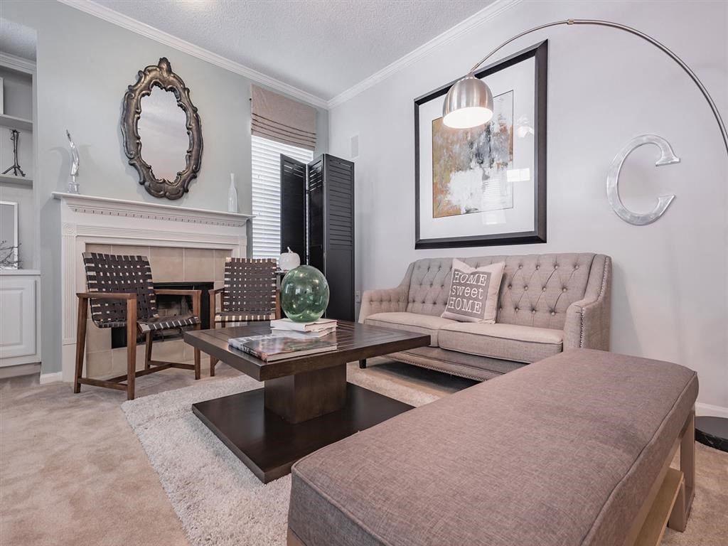 a living room with a couch and a table