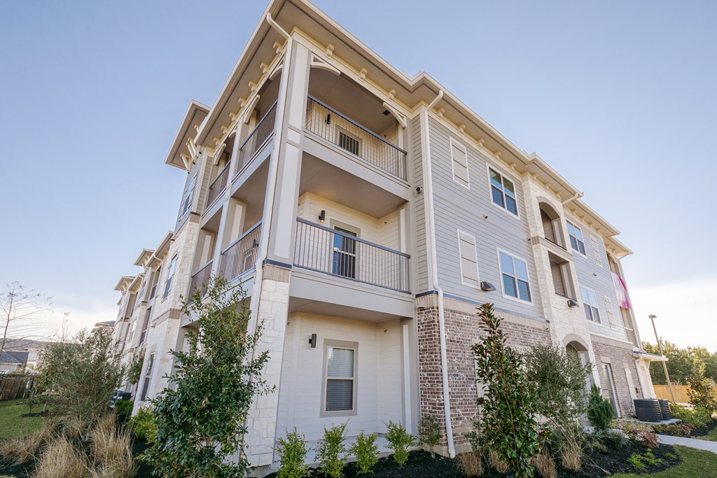 Property Building Exterior at Cue Luxury Apartments, Cypress, TX, 77433