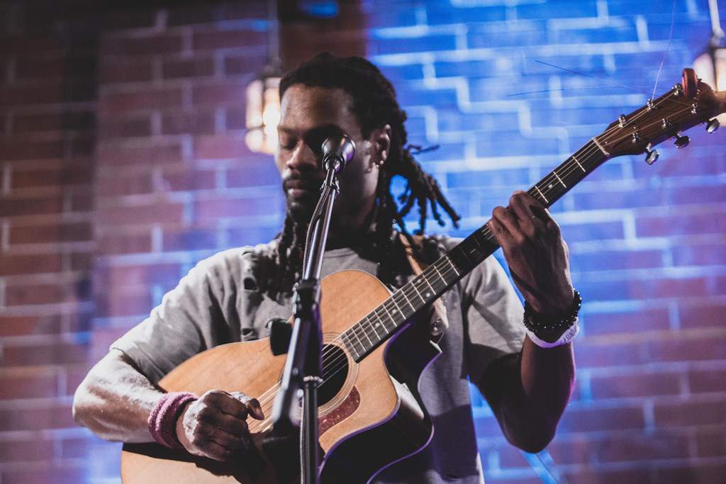 Man Playing Guitar at The Collective NoDa, North Carolina