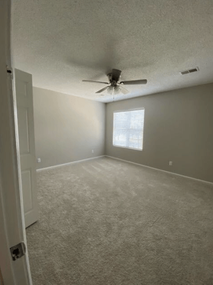 A room with a ceiling fan and a window at Diamond Townhomes, South Carolina, 29906