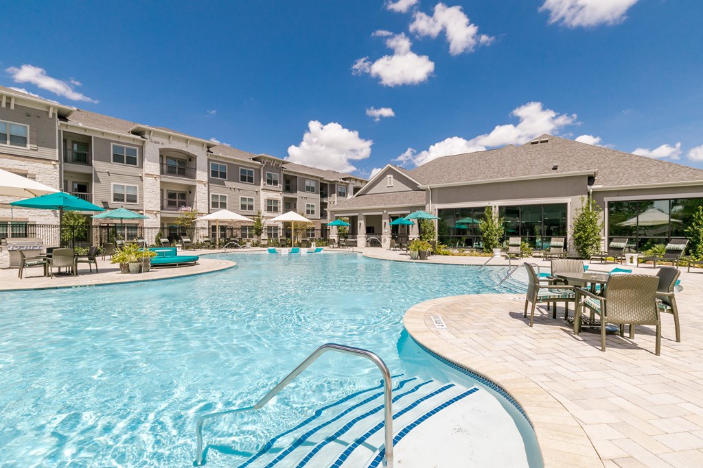 Glimmering Pool at Cue Luxury Apartments, Cypress, TX