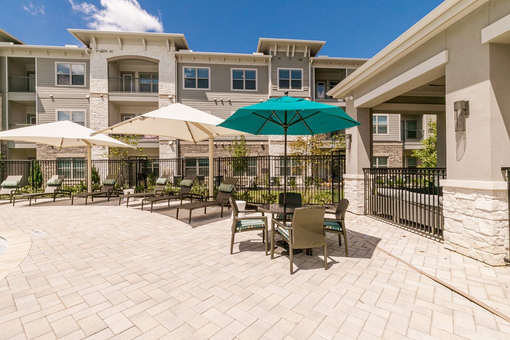 Outdoor Grill With Intimate Seating Area at Cue Luxury Apartments, Texas, 77433