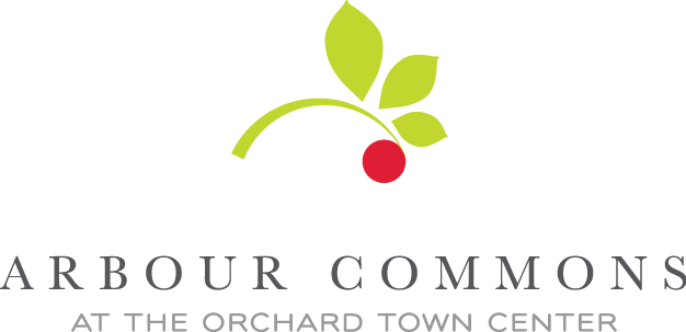 A logo with a green leaf and a red cherry on it.