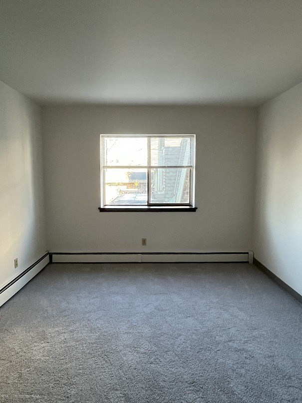 an empty room with a window in it