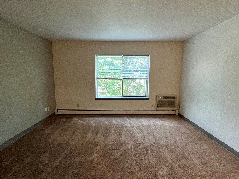 an empty room with a window