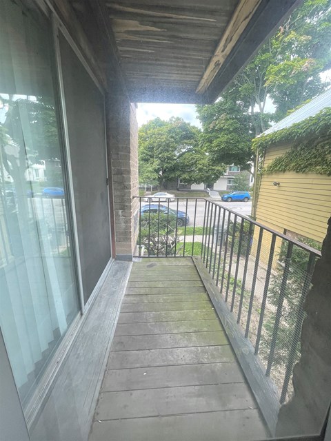 a view of the balcony from the front of the house