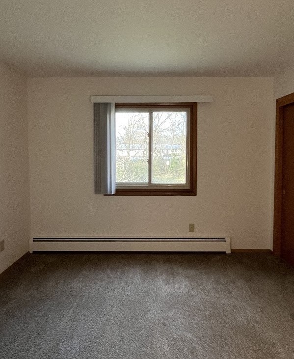 an empty room with a window in it