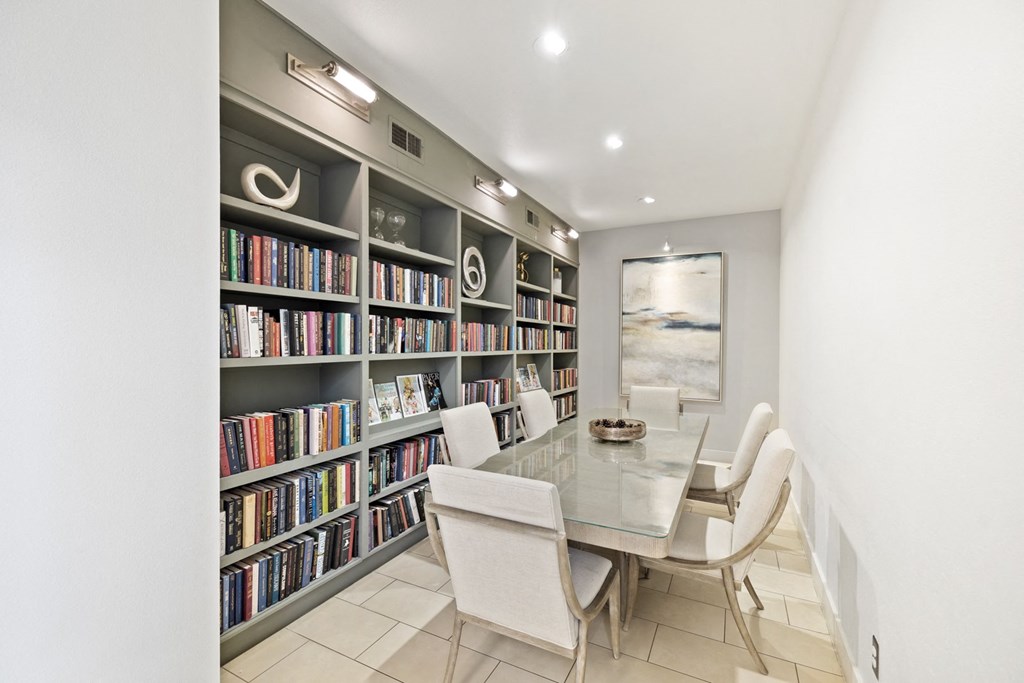 Resident library with table and chairs