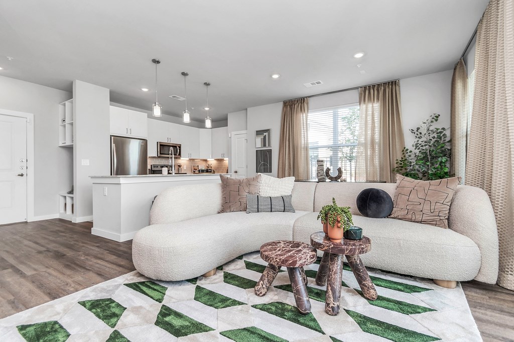a living room with a couch and a table