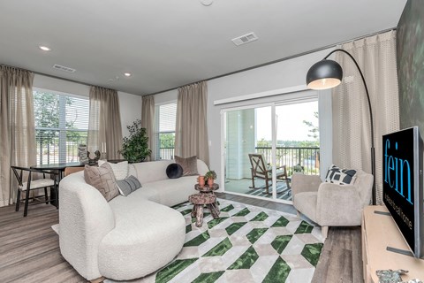 Apartment living area with private balcony