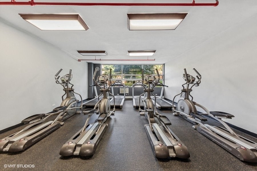 the gym at the landing combines cardio equipment with treadmills