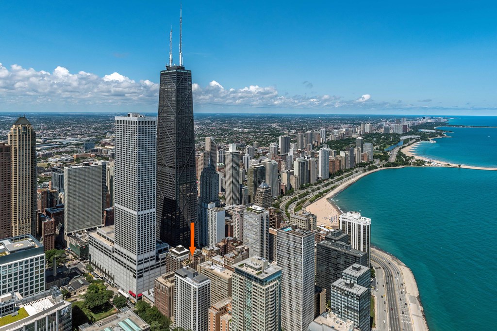 a view of the chicago skyline and lake michigan