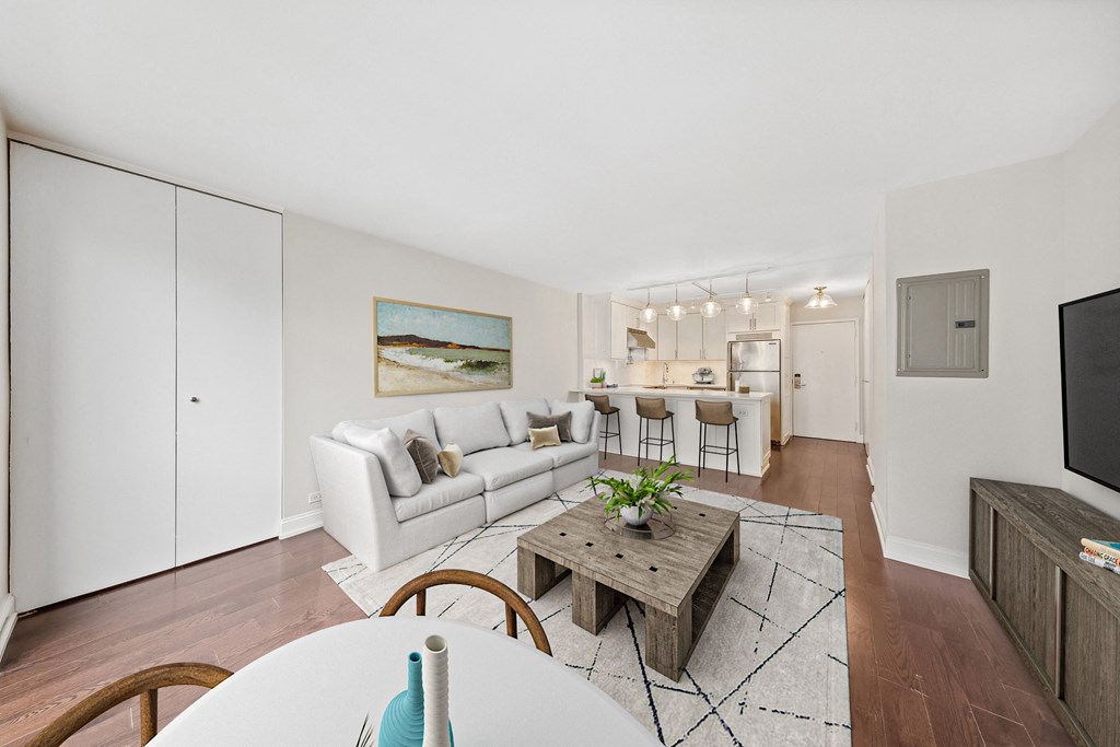 a living room with a couch and a table