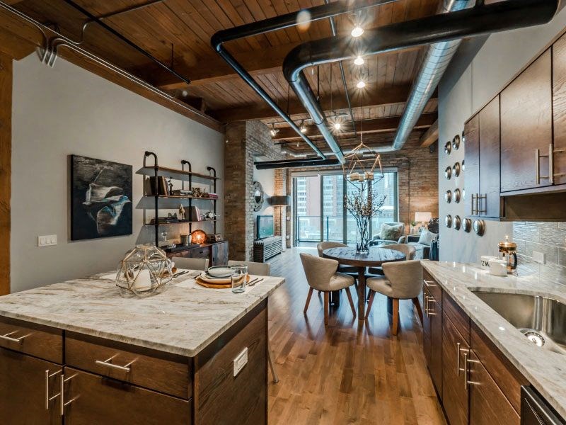 a kitchen and dining area in a loft
