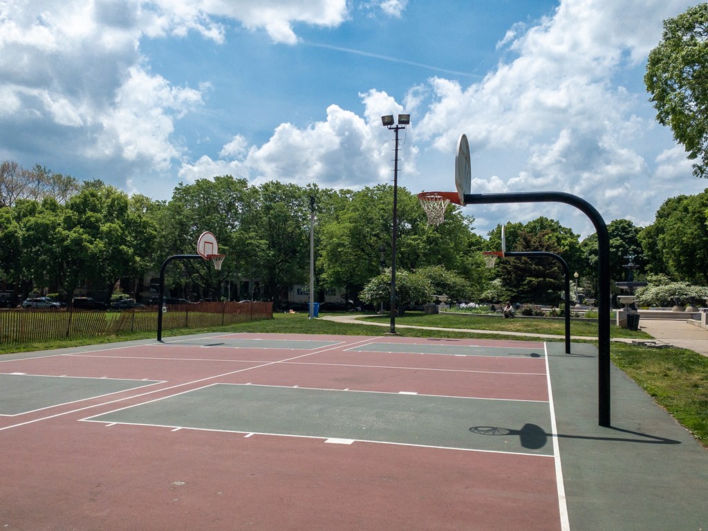 a basketball court at the park