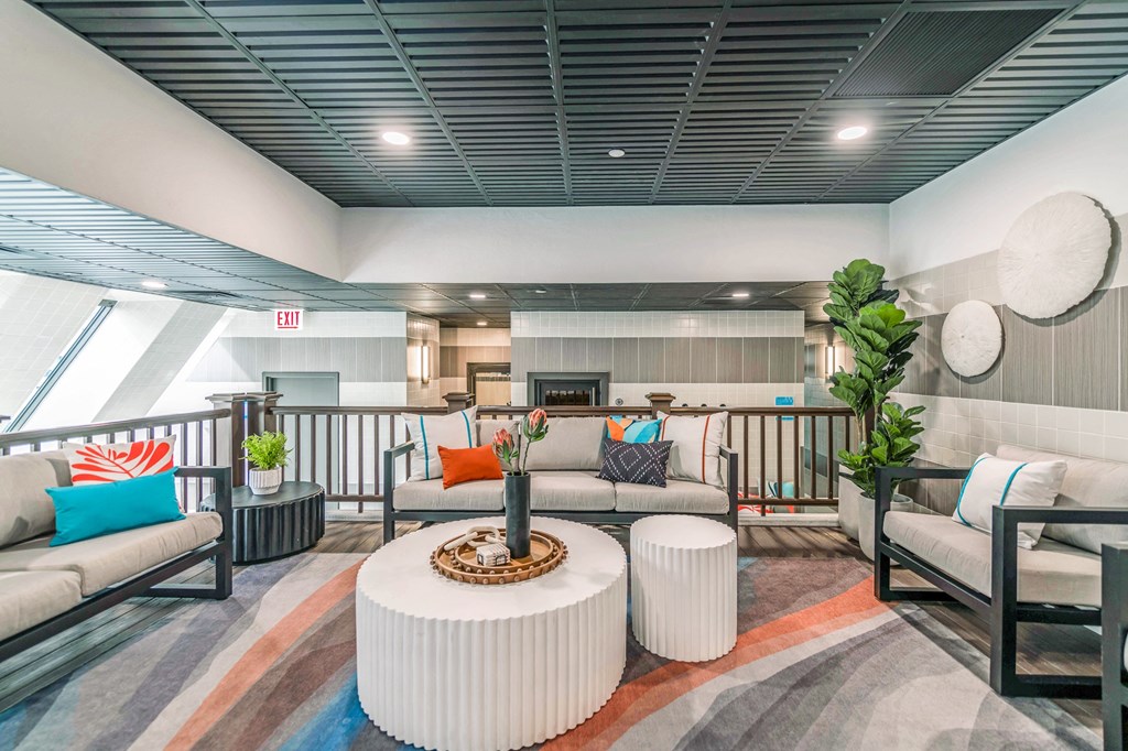 a resident clubhouse with couches and a coffee table