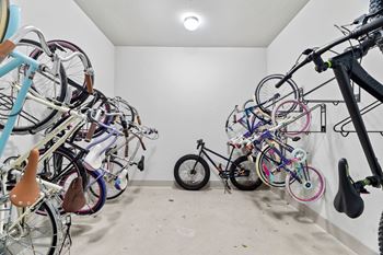 A room full of bicycles of various types and sizes.