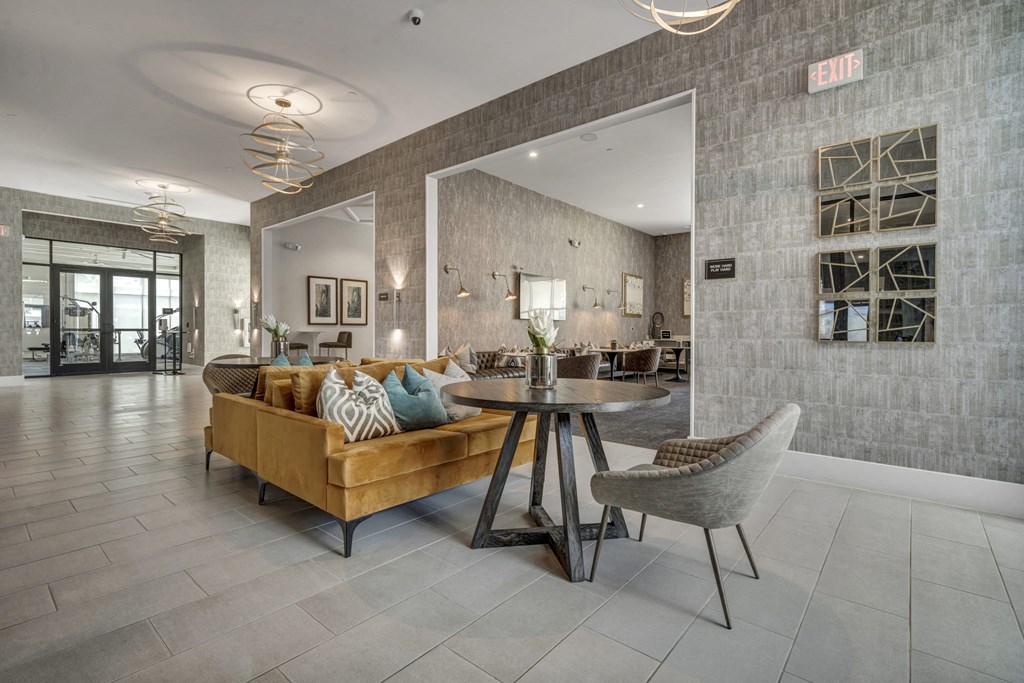 a living room with a couch and a table