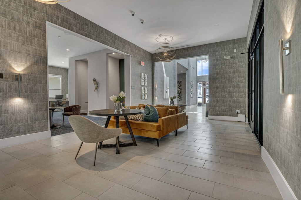 a living room with a couch and a table