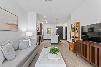 a living room with a couch and a table