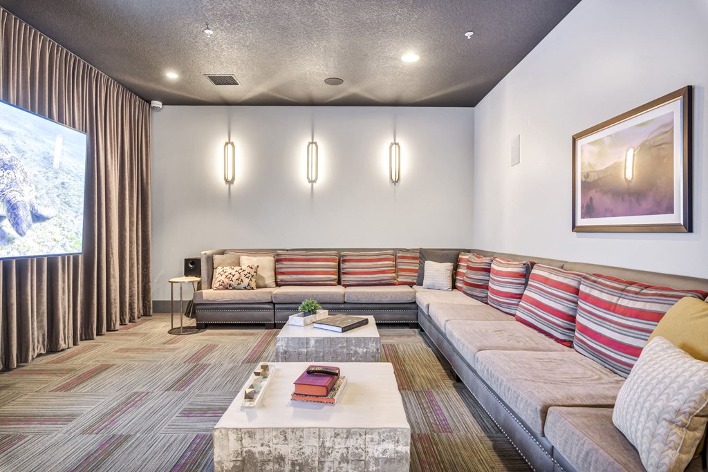 a living room with couches and a coffee table