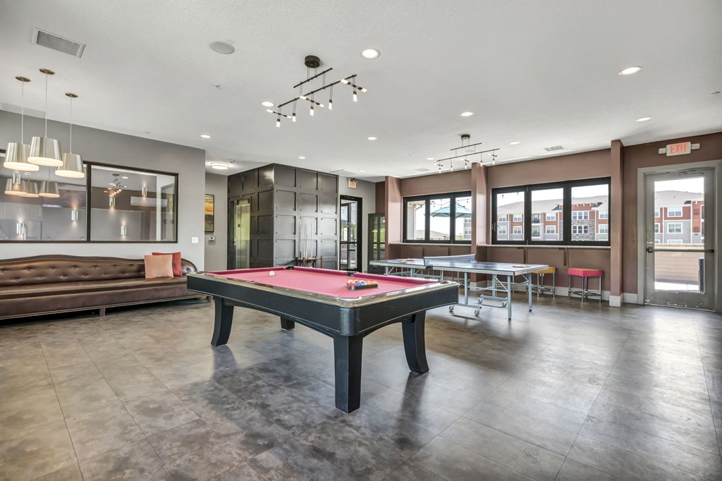 play a game of pool in our clubhouse at our apartments