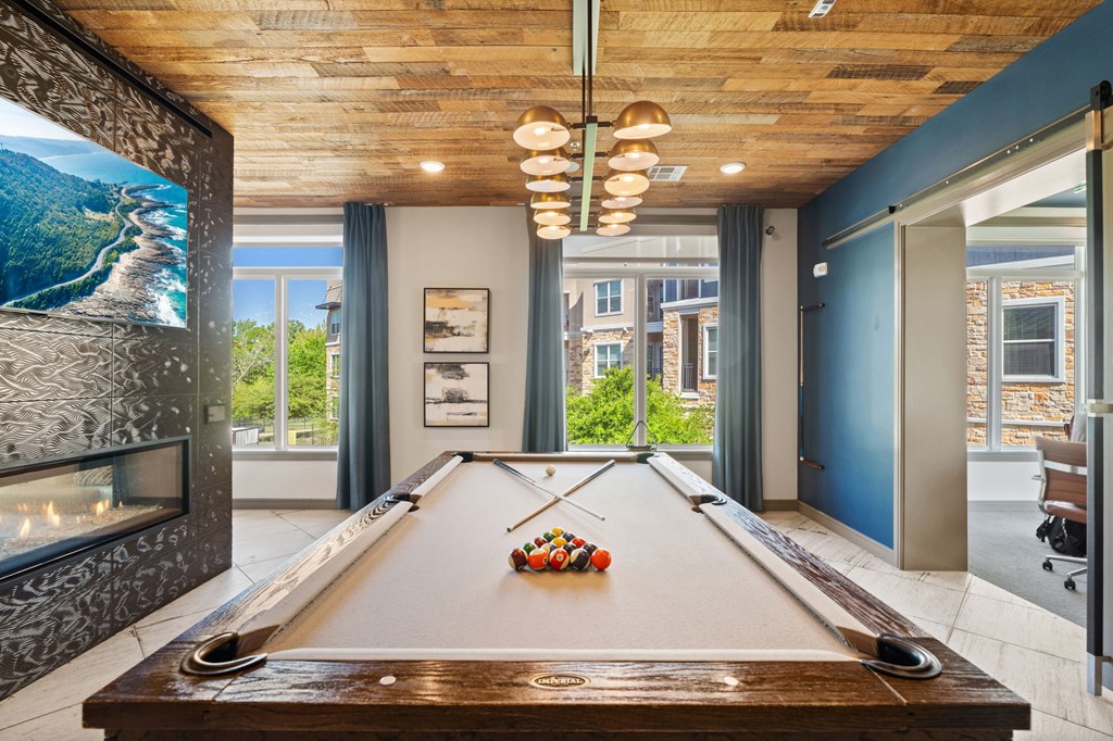 A pool table with a billiard ball on it.