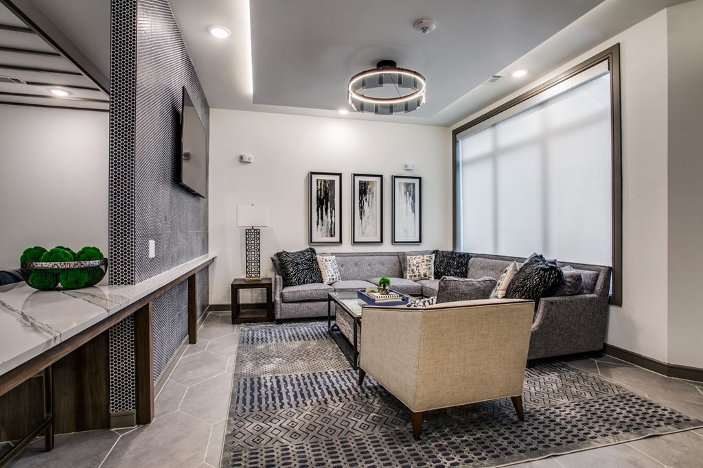 a living room with a couch and a table