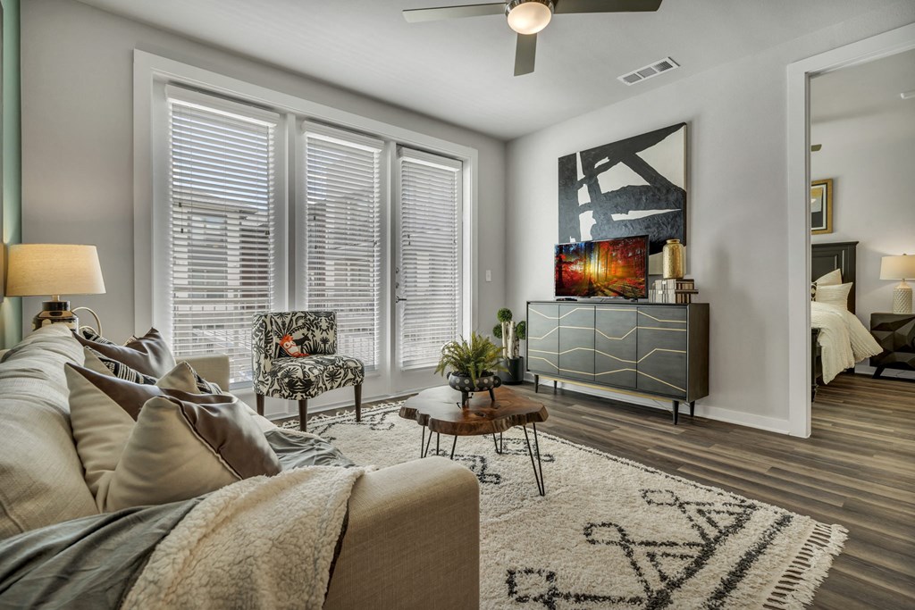 a living room with a couch and a tv