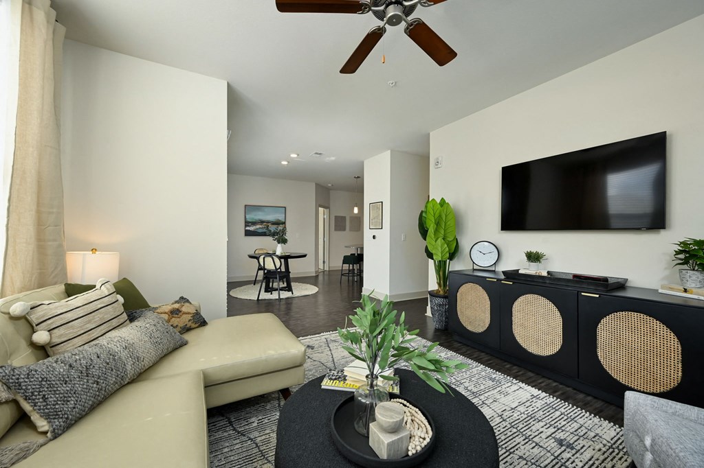 a living room with a couch and a tv