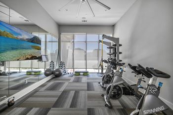 a workout room at the m on hennepin apartments in minneapolis, mn