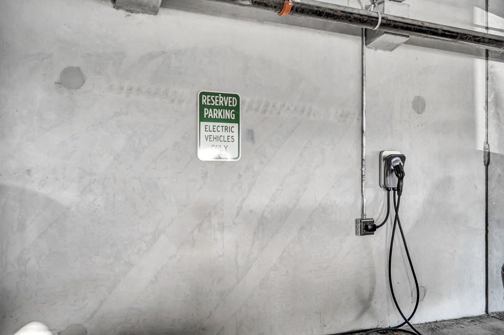 a sign on the side of a building that says restricted parking