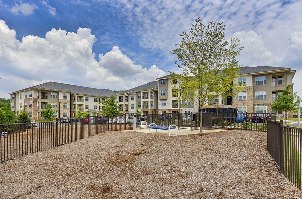the preserve at ballantyne commons courtyard with playground and apartment buildings